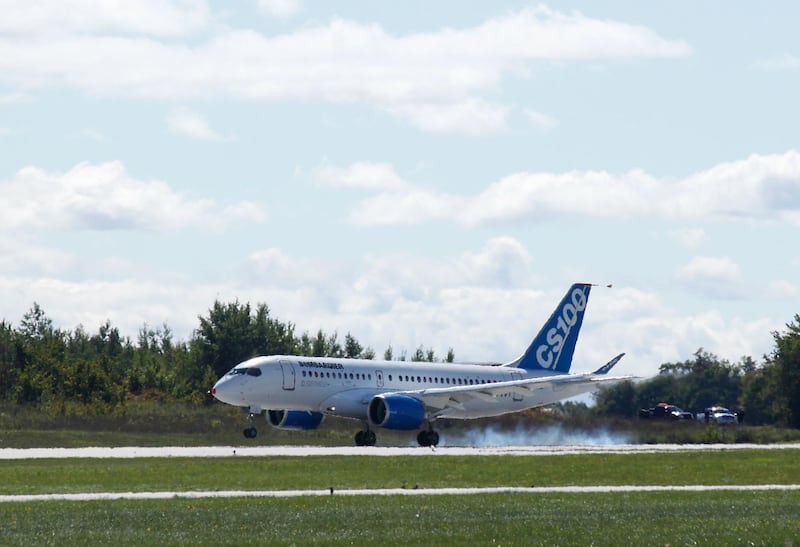 (FILES) This file photograph taken on September 16, 2013, shows the new bombardier aircraft CSeries landing in Mirabel, Quebec. 
US trade officials are expected to confirm massive tariffs on Bombardier planes December 19, 2017 in a case that has inflamed relations between Washington and Ottawa. The trade dispute stems from a complaint by US aerospace giant Boeing against its Canadian rival that found a receptive ear in US President Donald Trump, whose "America First" agenda has vowed a tough line in matters of international commerce.
 / AFP PHOTO / Clement Sabourin