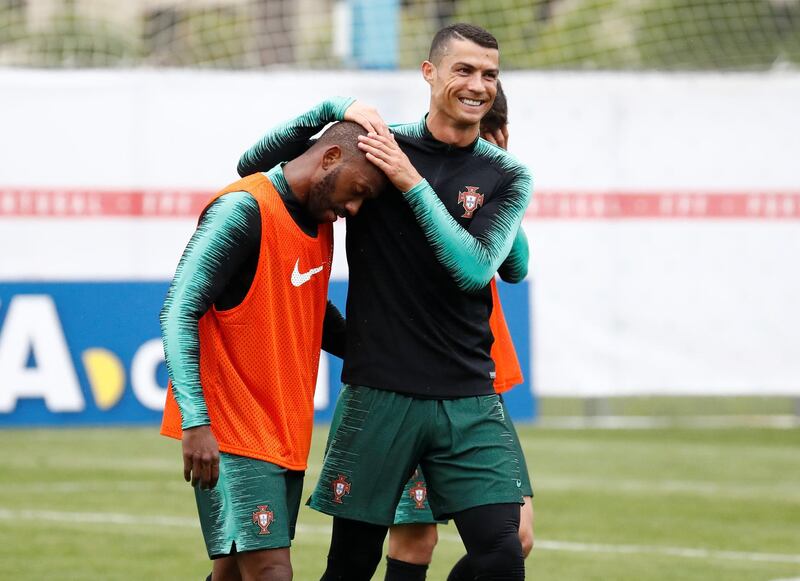 Cristiano Ronaldo and Manuel Fernandes take part in a training session for Portugal. Sergei Karpukhin / Reuters