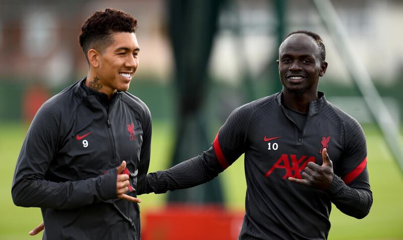 LIVERPOOL, ENGLAND - SEPTEMBER 25: (THE SUN OUT, THE SUN ON SUNDAY OUT) Sadio Mane and Roberto Firmino of Liverpool during the training session at Melwood Training Ground on September 25, 2020 in Liverpool, England. (Photo by Andrew Powell/Liverpool FC via Getty Images)