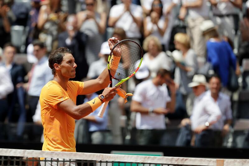 Spain's Rafael Nadal celebrates after winning a quarter final match against Italy's Fabio Fognini, at the Italian Open tennis tournament in Rome, Friday, May 18, 2018. Nadal won 4-6, 6-1, 6-2. (AP Photo/Andrew Medichini)