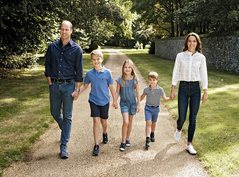 William and Kate with their children Prince George, Princess Charlotte and Prince Louis in Norfolk. PA