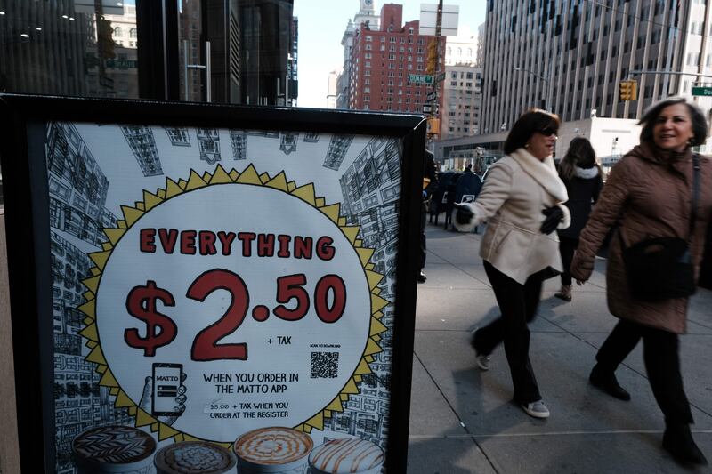 A store in Manhattan promotes its prices. US consumer prices rose by 0.4 per cent in February from January, according to Labour Department data. AFP