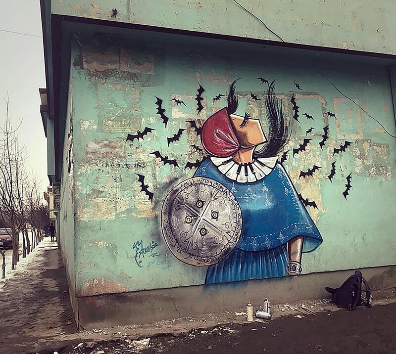 One of Shamsia Hassani‚Äôs 2019 work on a Kabul wall. Musical instruments are a common theme in her work which signify women‚Äôs need to use tools other than their voices to be heard. Picture courtesy of Shamsia Hassani 
