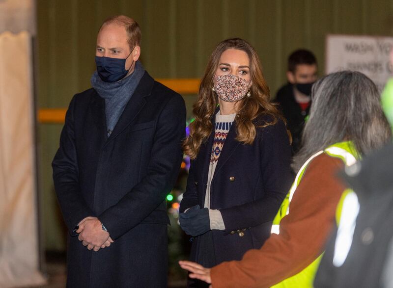 Prince William, Duke of Cambridge and Catherine, Duchess of Cambridge, visit a food bank at Old Smithfield Market on the second day of a three-day tour across the country in Manchester, England. During the tour the royal couple will visit communities, outstanding individuals and key workers to thank them for their efforts during the coronavirus pandemic. Getty Images