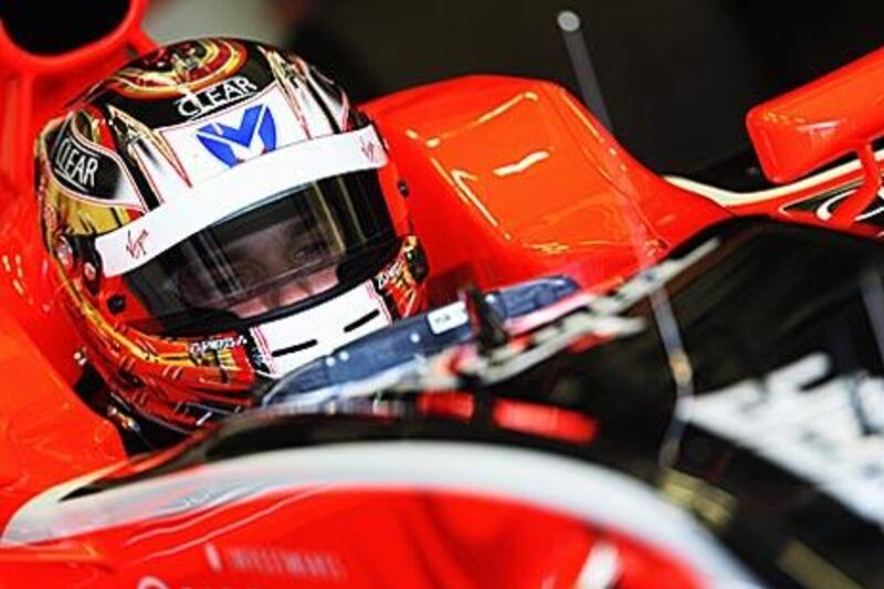 Timo Glock sits in his VR-01 car during testing in Jerez.