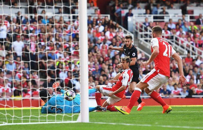 Adam Lallana of Liverpool scores his team’s second goal during the Premier League match between Arsenal and Liverpool at Emirates Stadium on August 14, 2016 in London, England. Michael Regan / Getty Images