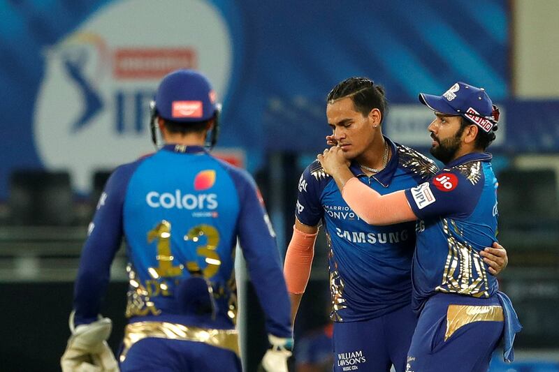 The Mumbai Indians  celebrates the wicket of  Virat Kohli captain of Royal Challengers Bangalore during match 10 of season 13 of the Dream 11 Indian Premier League (IPL) between The Royal Challengers Bangalore and The Mumbai Indians held at the Dubai International Cricket Stadium, Dubai in the United Arab Emirates on the 28th September 2020.  Photo by: Saikat Das  / Sportzpics for BCCI