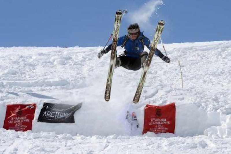 An Afghan Hazara competitor launches himself during the third annual Afghan Ski Challenge in the Shahidan Valley of Bamiyan province.