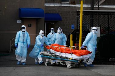 Healthcare workers wheel the body of deceased person from the Wyckoff Heights Medical Center during the outbreak of the coronavirus disease (COVID-19) in the Brooklyn borough of New York City, New York, U.S., April 2, 2020. REUTERS/Brendan Mcdermid