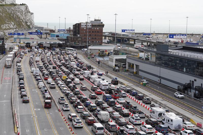 Long car queues at Dover. PA