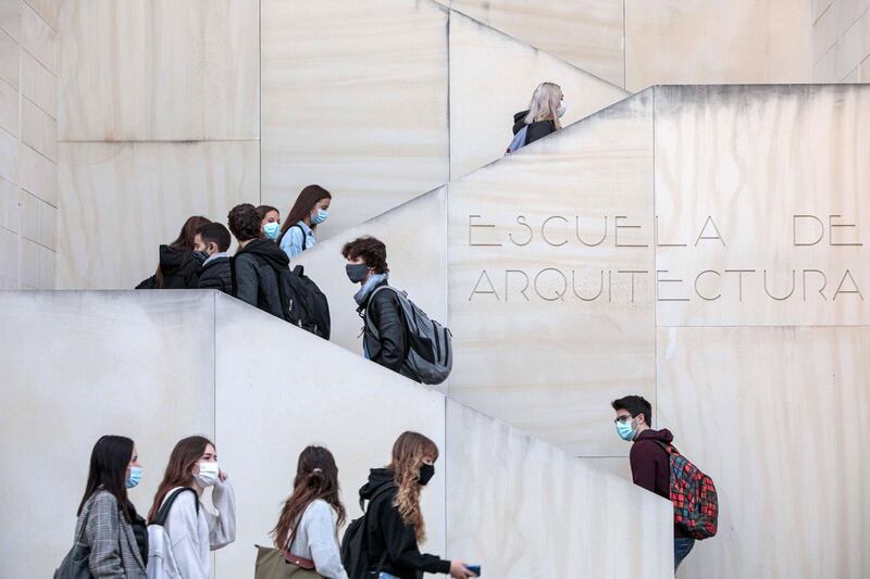 Students arrive at Politecnica university, in Valencia, Spain. EPA