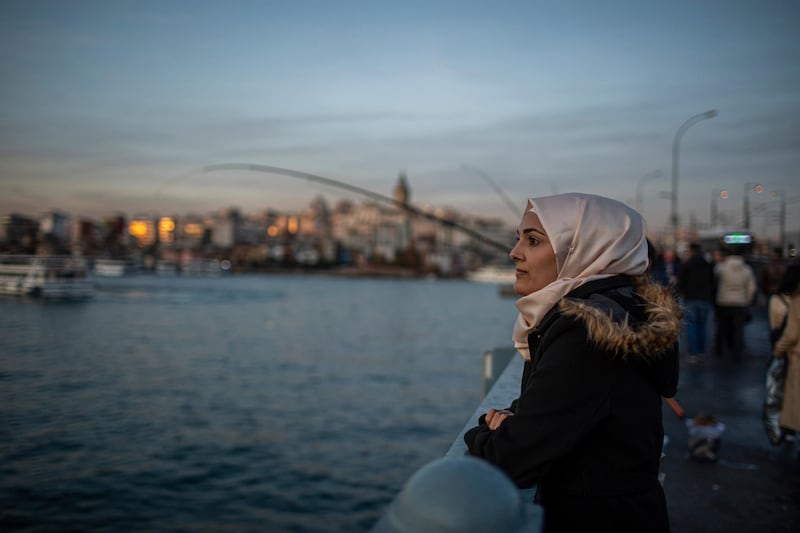 STRICTLY NO USE BEFORE 05:00 GMT (09:00 UAE) 18 JUNE 2020

“It is my favourite city in the whole of Turkey. It is big and busy, and despite being crowded and the travelling I have to do get to university, I still love it.’’

Sidra Taleb looks out across the water from the Galata Bridge in Istanbul. The 21-year-old Syrian refugee from Aleppo has been living here since 2014 and is studying dentistry thanks to a Turkiye Burslari scholarship. ; In 2019, Turkey continues to be home to the world’s largest refugee population (around 4 million, including nearly 3.7 million registered Syrian refugees). Refugee students have been awarded full scholarships to study at Turkish universities with UNHCR’s support. These scholarships cover the full duration of academic study towards a degree, provide monthly stipends to cover living expenses, and offer activities where students can meet and create peer support networks. UNHCR works with key actors in the higher education sector including the Higher Education Council and Turks Abroad and Related Communities (YTB), and convenes a higher education working group that brings together different actors who provide scholarships, disseminate information on higher education opportunities and have support or bridging programmes for students.