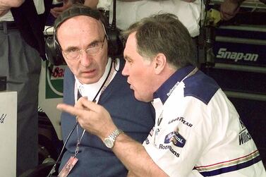 (FILES) In this file photo taken on October 26, 1997 Williams Formula One team founders Frank Williams (L) and technical director Patrick Head (R) talk ahead of the season-ending European formula one Grand Prix in Jerez. The historic Williams Formula One team has been bought by US-based investment firm Dorilton Capital, ending 43 years of family ownership, it was announced on August 21, 2020. / AFP / Eric CABANIS