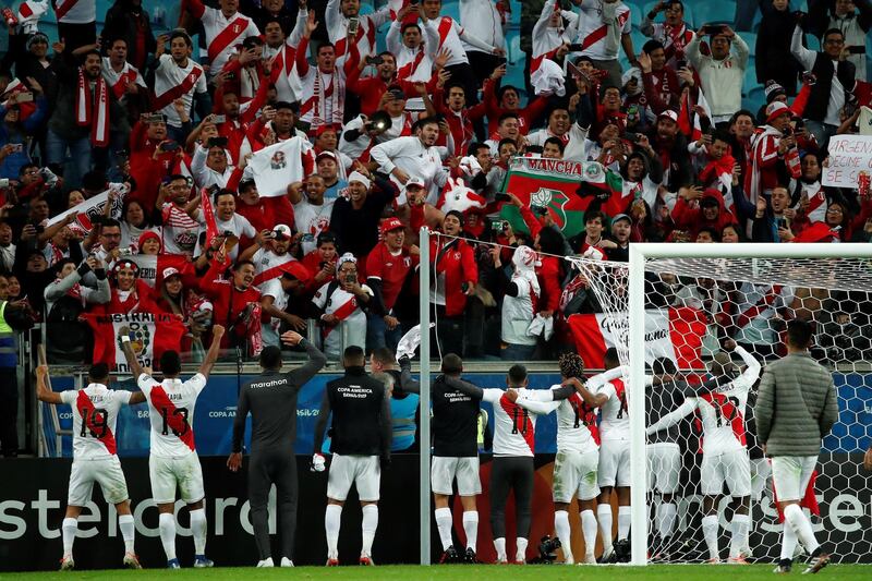 Peru's players celebrate their victory during the Copa America 2019 semi-finals soccer match between Chile and Peru at Arena do Gremio Stadium in Porto Alegre, Brazi. EPA