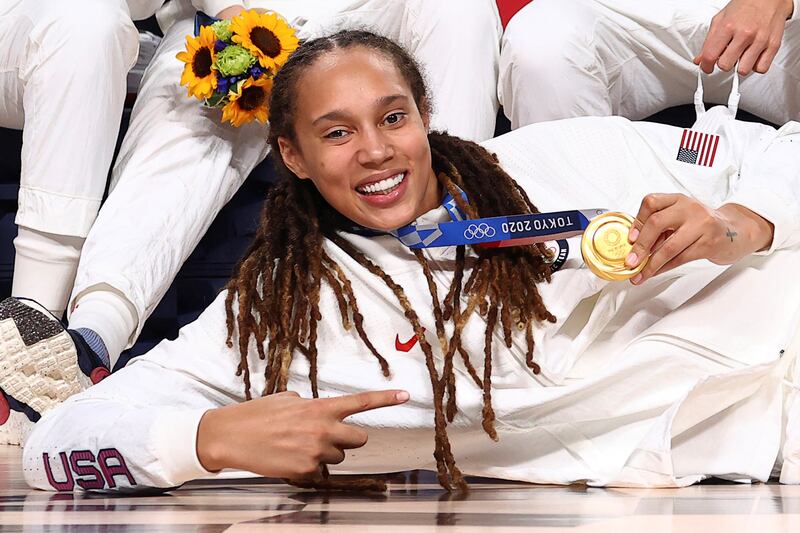 Griner poses with her gold medal in Women's Basketball at the Tokyo 2020 Summer Olympics at the Saitama Super Arena in Saitama, Japan, August 8, 2021. Reuters