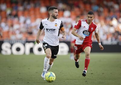 Valencia defender Jose Luis Gaya, left. EPA