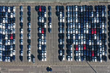 Cars parked up after coming off the production line at the Vauxhall manufacturing plant at Ellesmere Port in north west England . The slump in Britain's car production was the worst January performance since 2009. AFP