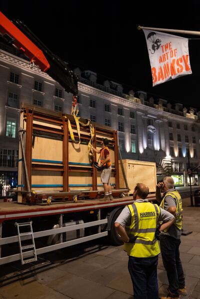The £6 million 'Valentine's Day Mascara' work is unloaded for The Art of Banksy exhibition in Regent Street, central London. PA 