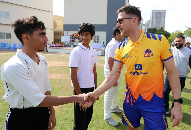 Former England international Joe Denly meets students. 