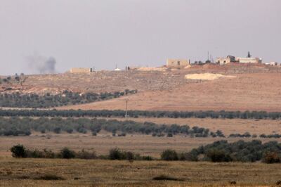 Smoke billows from an Kurdish-controlled area of Syria being shelled by Turkish forces. AFP 