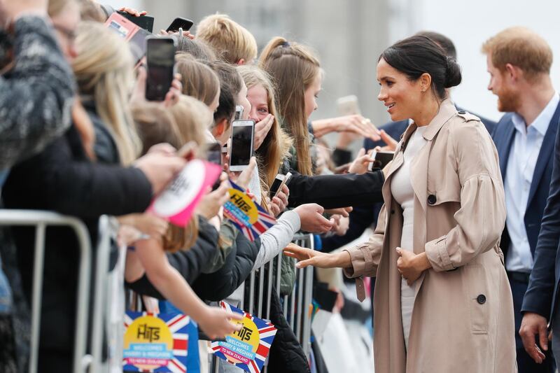 Meghan meets fans on the street in Auckland. Getty Images