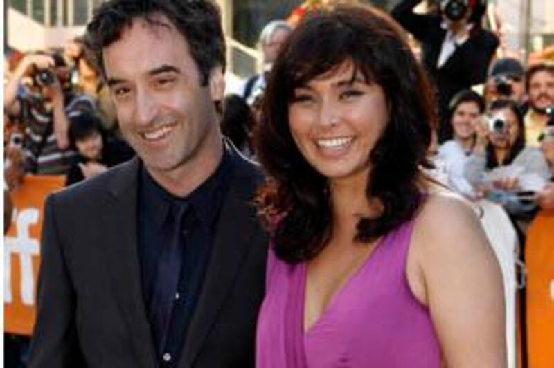 Cast members Lisa Ray (R) and Don McKellar pose at the gala presentation for the film "Cooking With Stella" during the 34th Toronto International Film Festival in Toronto September 16, 2009.  REUTERS/Mike Cassese   (CANADA ENTERTAINMENT)