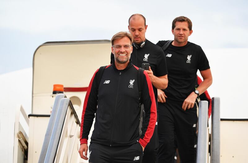 epa06761289 A handout photo made available by the UEFA of Liverpool manager Juergen Klopp (L) arriving ahead of the UEFA Champions League final at IEV Airport in Kiev, Ukraine, 24 May 2018. Liverpool FC will face Real Madrid in the UEFA Champions League final at the NSC Olimpiyskiy stadium in Kiev on 26 May 2018.  EPA/UEFA / HANDOUT  HANDOUT EDITORIAL USE ONLY/NO SALES