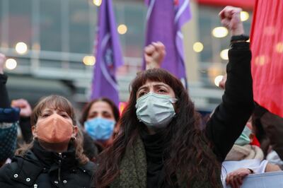 Protestersw chant slogans during a demonstration in Istanbul, Friday March 26, 2021, against Turkey's withdrawal from Istanbul Convention, an international accord designed to protect women from violence. The Istanbul Convention states that men and women have equal rights and obliges national authorities to take steps to prevent gender-based violence against women, but some conservative groups and some officials from Turkeys President Recep Tayyip Erdogan's Islamic-oriented ruling party say they promote homosexuality. (AP Photo/Emrah Gurel)