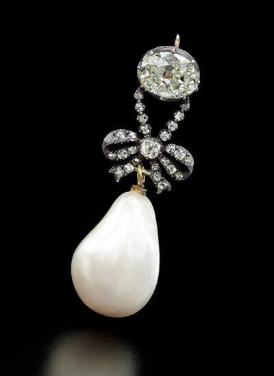 This undated handout photo released by Sotheby's Geneva shows a diamond and natural pearl pendant that once belonged to Marie Antoinette, expected to sell for $1-2 million. One of the most famous royal jewellery collections ever to come to auction will be coming to Sothebyâ€™s in Geneva on 12 Nov. 2018. Entitled â€œRoyal Jewels from the Bourbon-Parma Familyâ€, the auction will span centuries of European history, from the reign of Louis XVI to the fall of the Austro-Hungarian Empire, and will offer fascinating insights into the splendor of one of Europeâ€™s most important royal dynasties. (Sotheby's Geneva via AP)