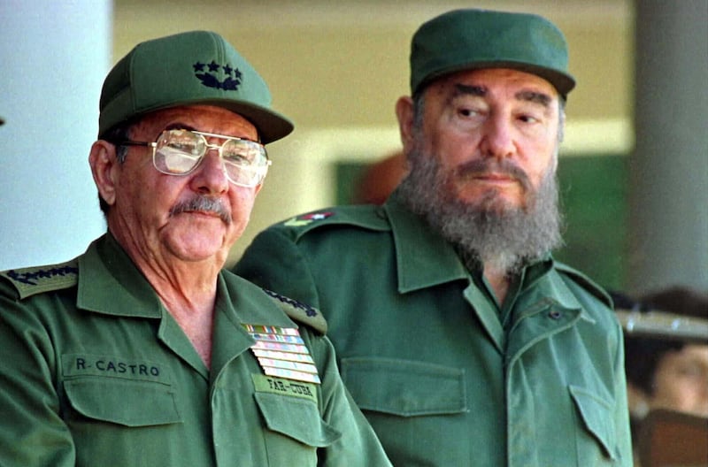 Cuban President Fidel Castro and his brother, Armed Forces Minister Raul Castro (L), preside over a ceremony marking the 100th anniversary of the death of independence hero Antonio Maceo, December 7. Cuba marked the day with a defiant message that the island is set on taking its Communist system into the next century.