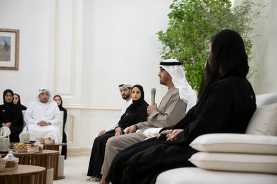President Sheikh Mohamed meets the team overseeing Cop28, at a Sea Palace majlis, on August 15. Rashed Al Mansoori / UAE Presidential Court