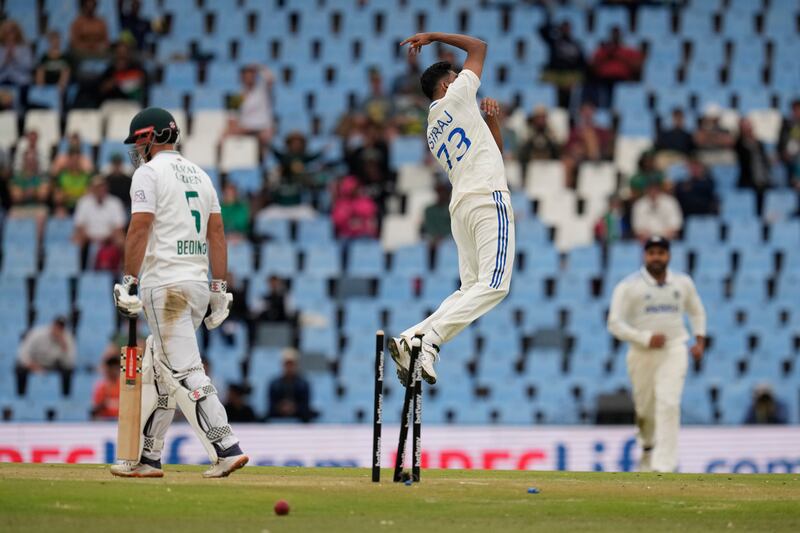 India's Mohammed Siraj, right, celebrates after bowling South Africa's David Bedingham for 56. AP 