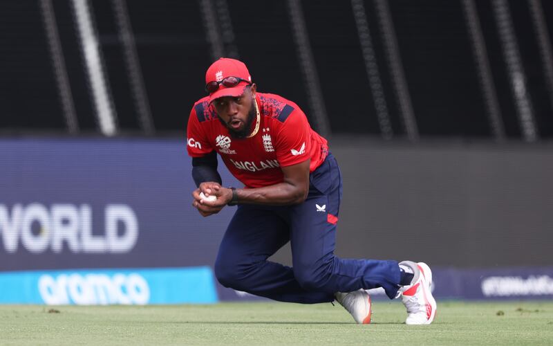 England's Chris Jordan takes a catch to dismiss Harmeet Singh of the USA for 21 off the bowling of Sam Curran. Getty Images