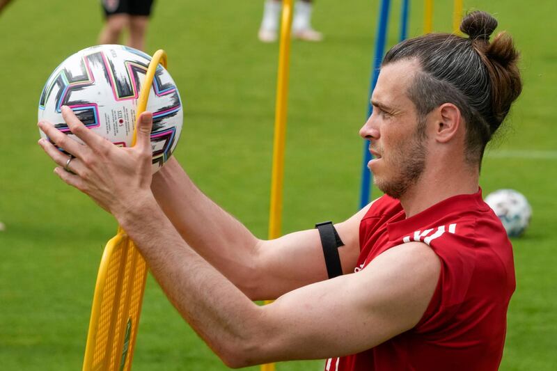 Wales captain Gareth Bale plays with the ball during a training session at Rome's Acqua Acetosa training centre ahead of the Euro 2020 last 16 tie against Denmark. AP