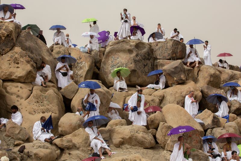 Pilgrims pray on top of the rocky hill known as the Mountain of Mercy, on the Plain of Arafat, near Makkah.