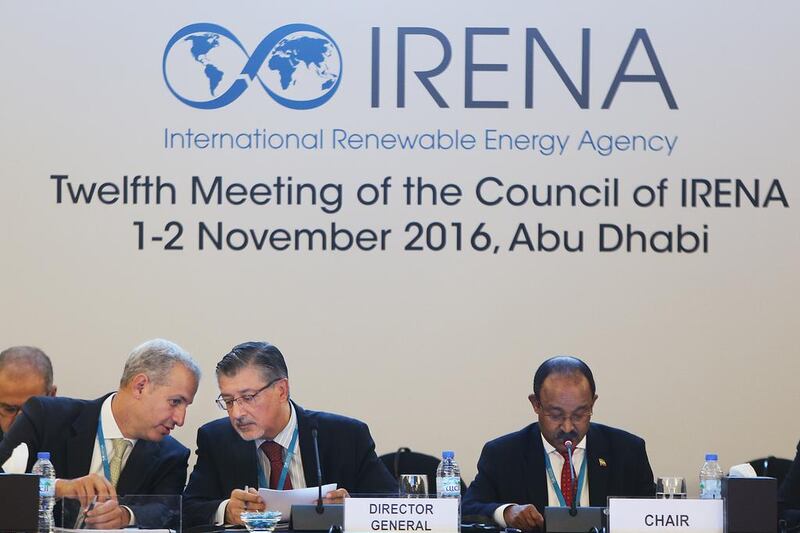 From left: Mohamed El Farnawany, Irena’s director of strategic management and executive direction; Adnan Amin, the Irena director general; and Abdulkadir Risku, the Ethiopian ambassador to the UAE. Irena was founded five years ago to promote renewable energy. Delores Johnson / The National