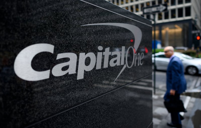 Capital One holders will own about 60 per cent of the combined company and Discover holders the remainder. AFP