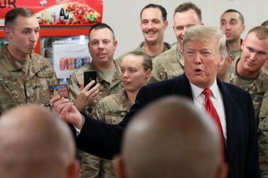 President Donald Trump speaks to US troops at Al Asad airbase in Iraq on December 26, 2018. Reuters