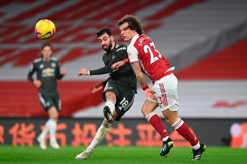 David Luiz, 7 -- Struggled with Fernandes at times but on the whole, showed the grit and determination that only a veteran defender can provide. AFP