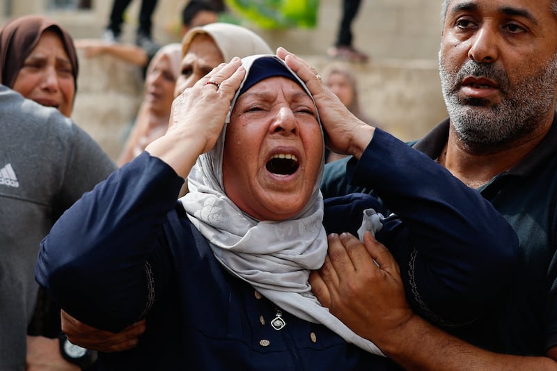 Grief at the funeral of Palestinians from the Shamalkh family, who health officials said were killed in Israeli strikes, in Gaza city. Reuters