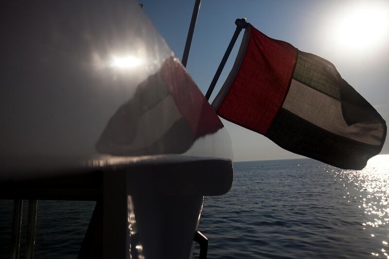 December 11, 2010, Sir Bani Yas Island, UAE:
The oldest monastery in the UAE has been discovered on Sir Bani Yas island. Sir Bani Yas island is a sprawling wildlife reserve larger than the island of Abu Dhabi and home to a vast array of wildlife.

A UAE flag glistens under the sun on a boat bound for the island.


Lee Hoagland/ The National