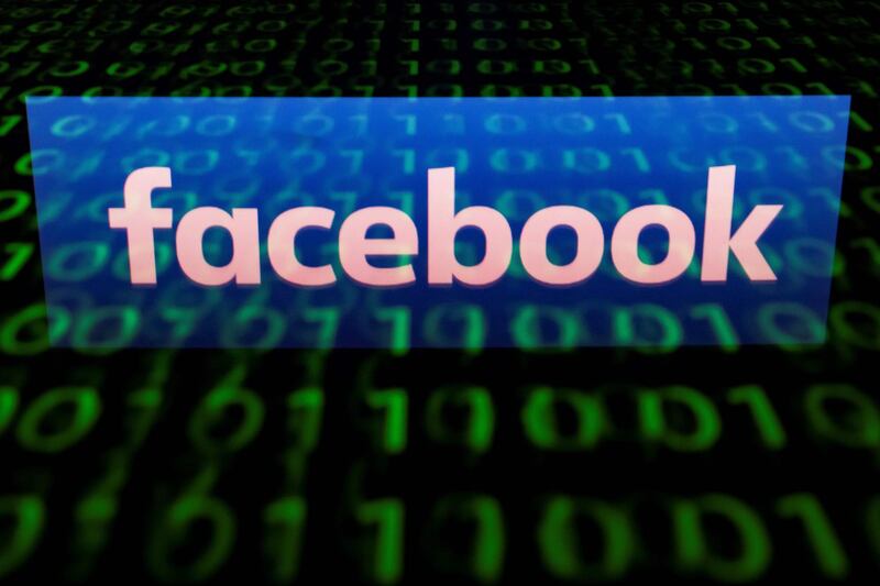 (FILES)  A file illustration picture taken on April 28, 2018 shows the logo of social network Facebook displayed on a screen and reflected on a tablet in Paris. - Facebook users around the world on Monday, September 3, 2018 reported the social network was inaccessible, with many taking to Twitter to voice their frustration. Reports of issues on the downdetector.com website began around 2100 GMT, with users particularly affected in North America and Europe. Some users attempting to log in to the site were met with a "Service Unavailable" message, while others received a longer note that said it would return online soon.
"Facebook is down for required maintenance right now, but you should be able to get back on within a few minutes," the longer message said. Thanks for your patience as we improve the site." (Photo by Lionel BONAVENTURE / AFP)