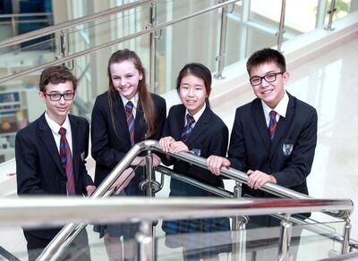 Abu Dhabi, U.A.E., July 5, 2018.
Brighton College year 8 students taking up the Mandarin language.  (L-R)  Alex Ure-13, Hollie Wilson-13,  Suah Yang-14 and Arvin Egli-13.
Victor Besa / The National
Section:  NA
Reporter:  Haneen Dajani