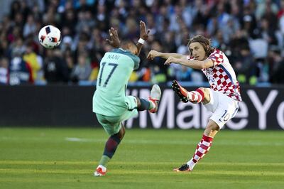 Luka Modric, right, is one of the main players in Croatia's road to Russia campaign. Miguel A Lopes / EPA