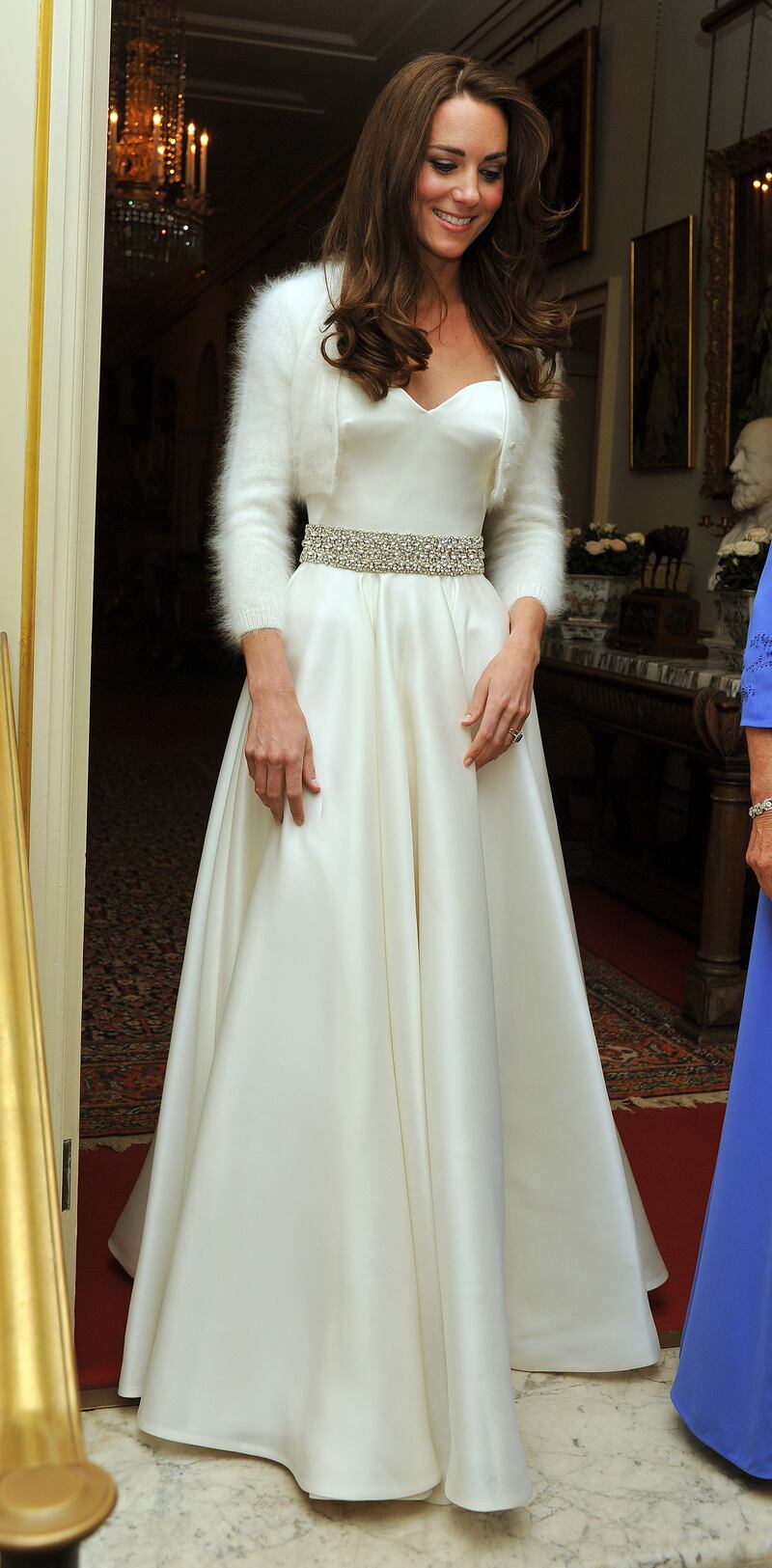 Catherine, Duchess of Cambridge, wearing her second Alexander McQueen wedding dress, leaves Clarence House to travel to Buckingham Palace for the evening celebrations following her wedding to Prince William on April 29, 2011 in London. Getty Images