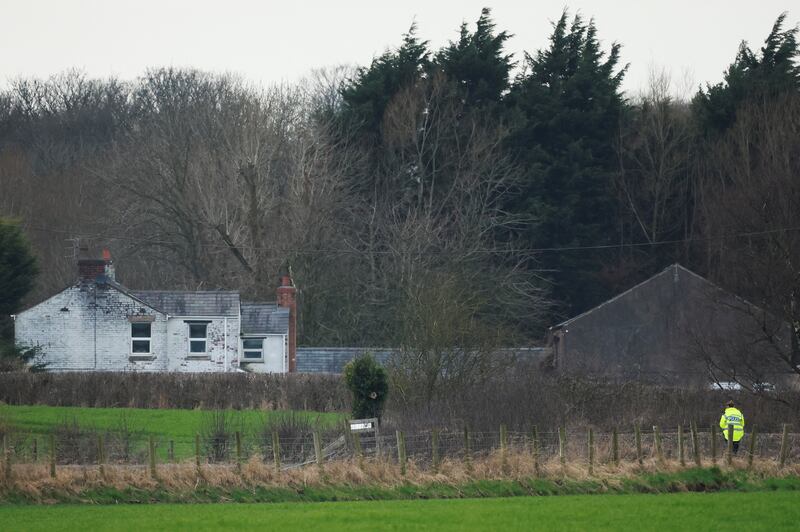 A police officer walks near to where a body, that is suspected to be missing woman Nicola Bulley, was found close to St Michael's on Wyre, Lancashire. Reuters