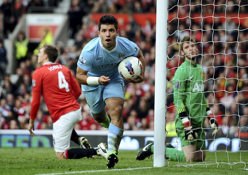 MANCHESTER, ENGLAND - OCTOBER 23:  Sergio Aguero of Manchester City celebrates scoring his team's third goal during the Barclays Premier League match between Manchester United and Manchester City at Old Trafford on October 23, 2011 in Manchester, England.  (Photo by Laurence Griffiths/Getty Images)