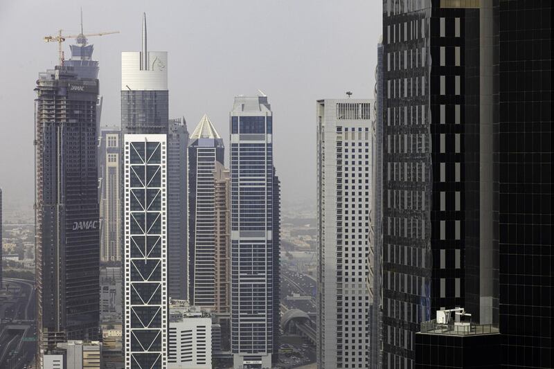 Skyscrapers stand on the city skyline in Dubai, United Arab Emirates, on Tuesday, July 23, 2019. Like the rest of the city, the business center has suffered from a prolonged real-estate slump brought on by oversupply and slower economic growth. Photographer: Christopher Pike/Bloomberg