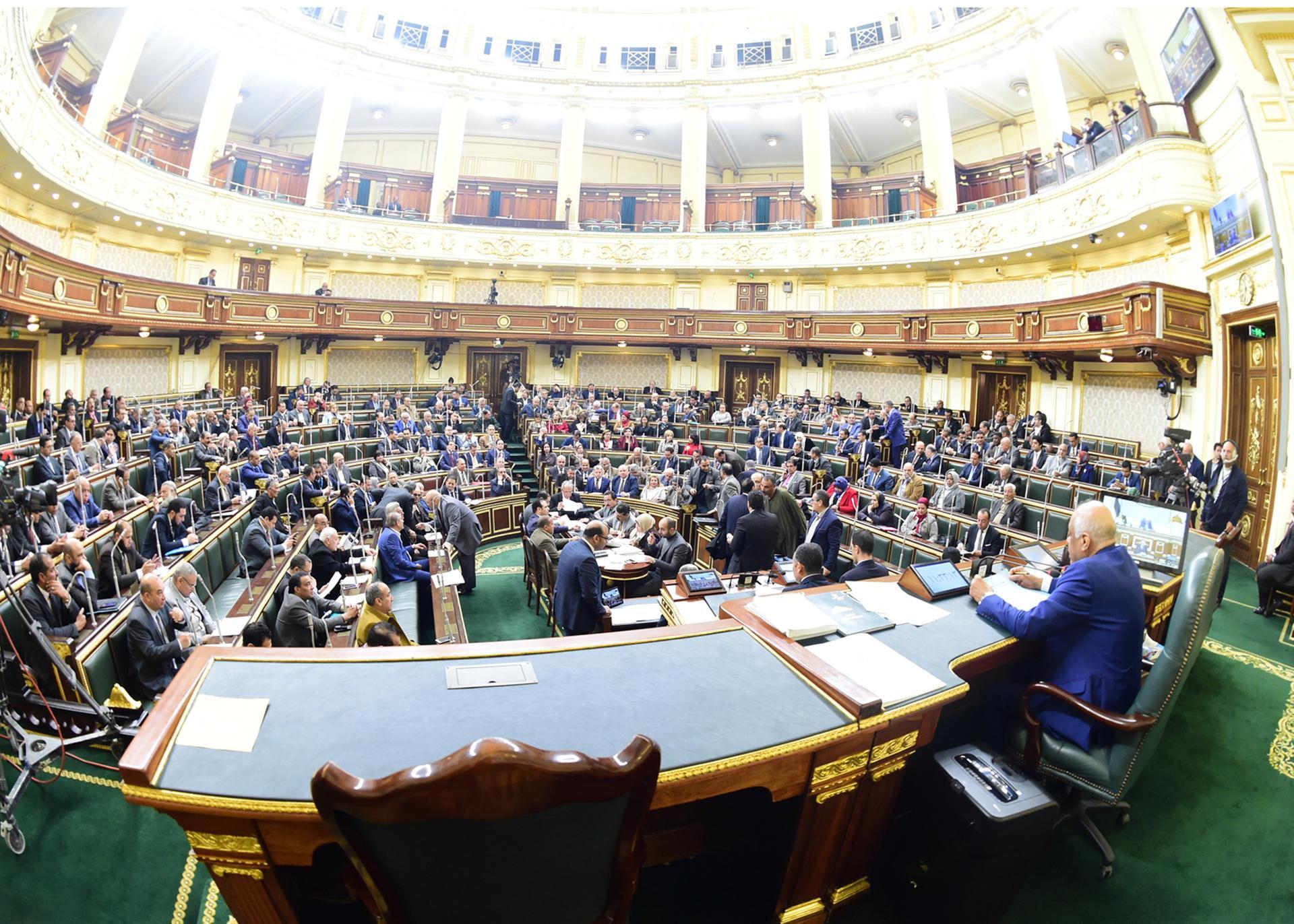 epa07369265 A picture taken with a fish eye lens shows speaker of the Egyptian House of Representatives Ali Abdel Aal (R) presiding over a parliament session to discuss and vote on proposed constitutional amendments, in Cairo, Egypt, 14 February 2019. According to reports, the Egyptian Parliament on 14 February was due to vote on proposed amendments to articles of Egypt's 2014 constitution. The major proposed amendment is a transitional article that allows current Egyptian President Abdel Fattah al-Sisi to run for two more terms of six years each, as well as adding a Vice President position and bringing back the Senate that was cancelled in 2014.  EPA/KHALED MASHAAL