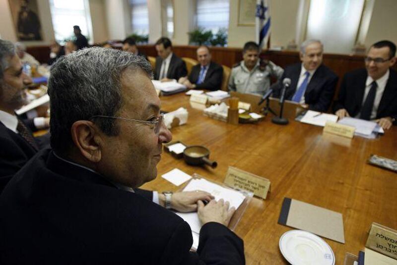 Ehud Barak, Israel's defence minister, left, claims Hamas has turned a blind eye to militant attacks.